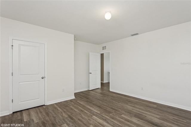 4005 Willow Branch Pl, Palmetto, FL 34221 - unfurnished bedroom featuring wood finished floors and baseboards