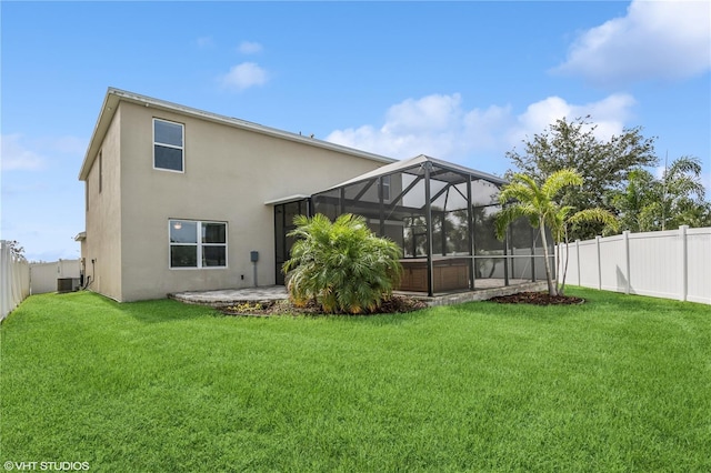 4005 Willow Branch Pl, Palmetto, FL 34221 - back of property featuring stucco siding, central AC unit, a patio, and a lanai