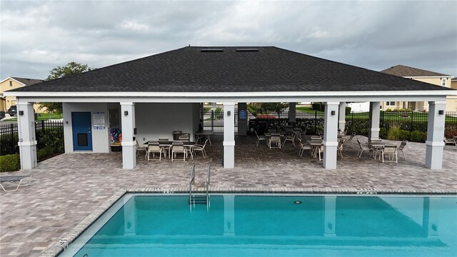 4005 Willow Branch Pl, Palmetto, FL 34221 - community pool featuring a patio and outdoor dining space