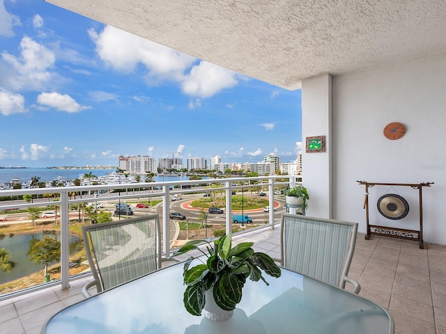 1233 N Gulfstream Ave Unit 401, Sarasota, FL 34236 - balcony with a city view and a water view