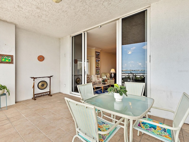 1233 N Gulfstream Ave Unit 401, Sarasota, FL 34236 - dining area featuring light tile patterned floors