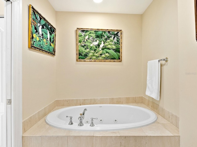 1233 N Gulfstream Ave Unit 401, Sarasota, FL 34236 - bathroom featuring a tub with jets