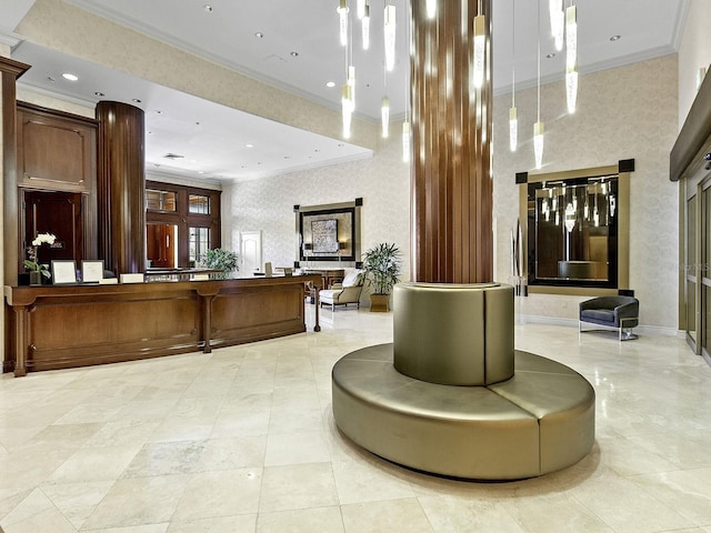 1233 N Gulfstream Ave Unit 401, Sarasota, FL 34236 - welcome area with ornamental molding, ornate columns, and recessed lighting