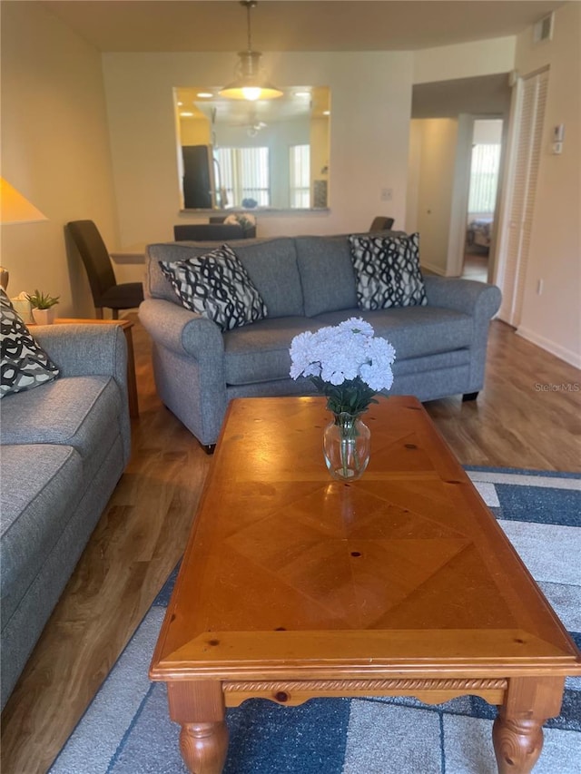 4520 47th Ave W Unit 103, Bradenton, FL 34210 - living area featuring wood finished floors and baseboards