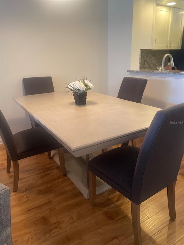4520 47th Ave W Unit 103, Bradenton, FL 34210 - dining space featuring light wood-type flooring