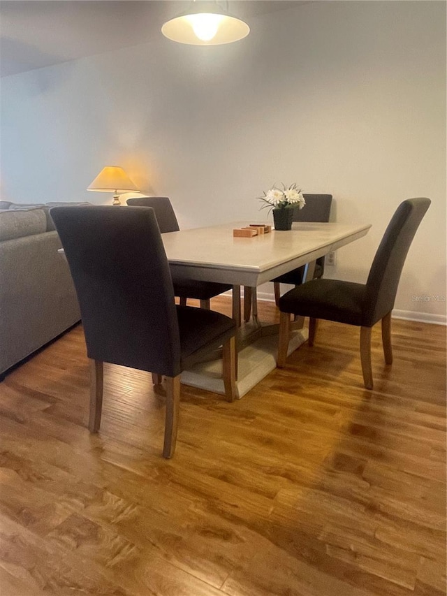 4520 47th Ave W Unit 103, Bradenton, FL 34210 - dining room featuring light wood-style floors