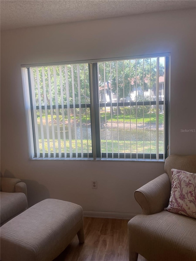 4520 47th Ave W Unit 103, Bradenton, FL 34210 - sitting room featuring wood finished floors