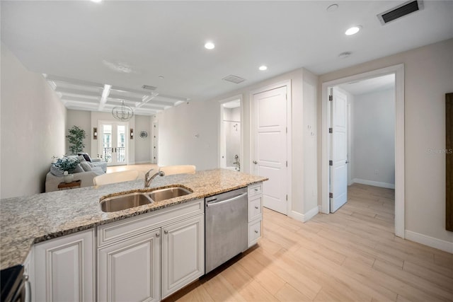 525 N Orange Ave Unit 302, Sarasota, FL 34236 - kitchen with stainless steel appliances, a sink, recessed lighting, light stone countertops, and baseboards