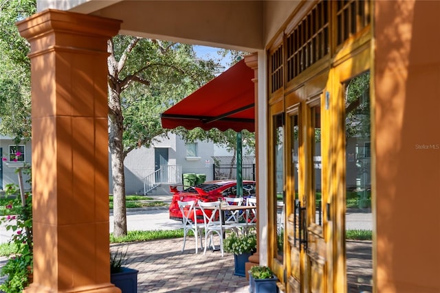 525 N Orange Ave Unit 302, Sarasota, FL 34236 - doorway to outside with brick patterned flooring