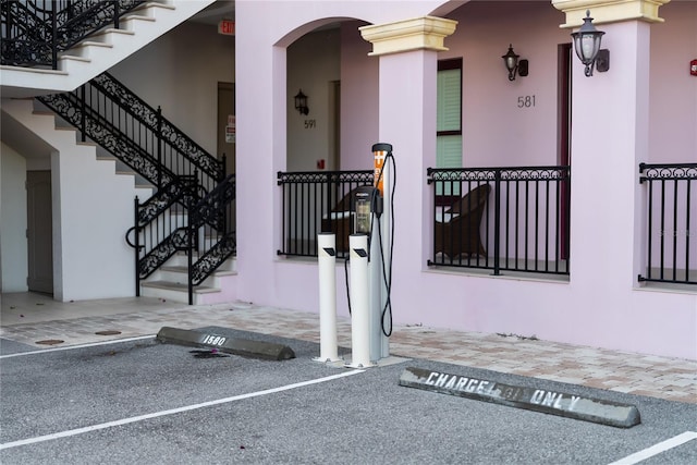 525 N Orange Ave Unit 302, Sarasota, FL 34236 - entrance to property with stucco siding and uncovered parking
