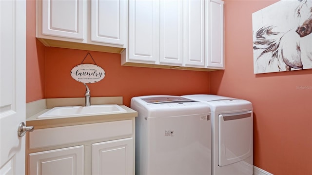 11625 Parrotfish St, Venice, FL 34292 - laundry room featuring cabinet space and independent washer and dryer