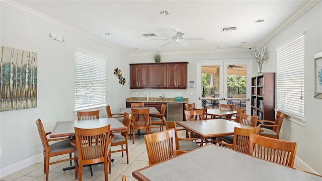 11625 Parrotfish St, Venice, FL 34292 - dining room with ceiling fan, ornamental molding, light tile patterned floors, and baseboards