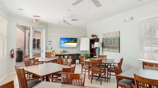 11625 Parrotfish St, Venice, FL 34292 - dining area featuring a ceiling fan, light tile patterned flooring, and ornamental molding