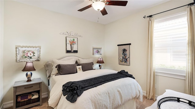 11625 Parrotfish St, Venice, FL 34292 - carpeted bedroom with baseboards and a ceiling fan