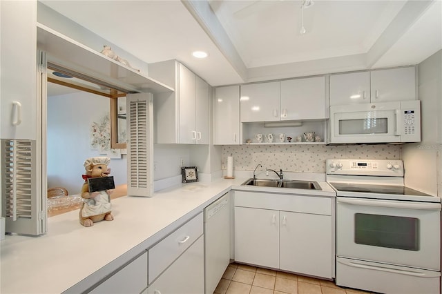 1350 N Portofino Dr Unit 402, Sarasota, FL 34242 - kitchen featuring white appliances, light countertops, open shelves, white cabinetry, and recessed lighting