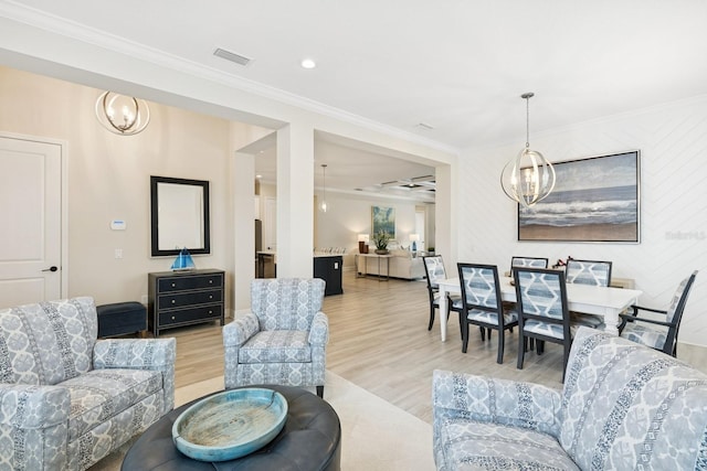 13606 Deep Blue Pl, Bradenton, FL 34211 - living area featuring a chandelier, crown molding, light wood-style flooring, and recessed lighting