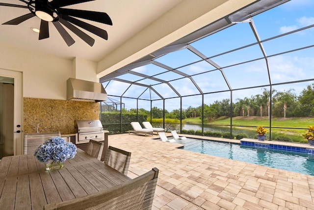 13606 Deep Blue Pl, Bradenton, FL 34211 - swimming pool with a patio area, a water view, a lanai, a ceiling fan, and view of wooded area