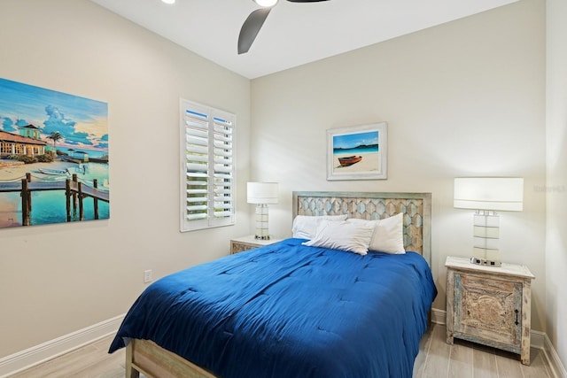 13606 Deep Blue Pl, Bradenton, FL 34211 - bedroom with baseboards, wood finished floors, and ceiling fan