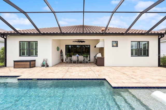 13606 Deep Blue Pl, Bradenton, FL 34211 - rear view of house with a patio area, a tile roof, and stucco siding