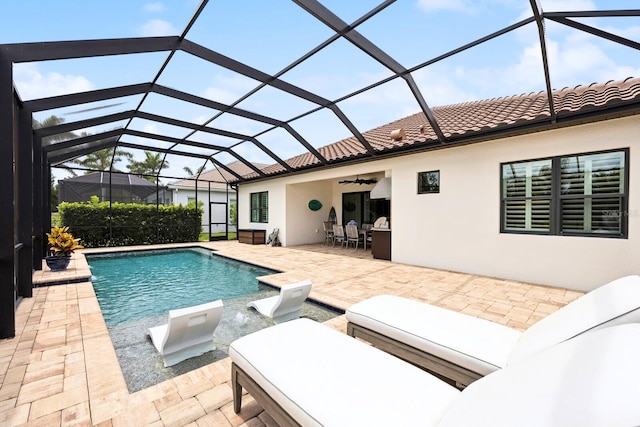 13606 Deep Blue Pl, Bradenton, FL 34211 - swimming pool featuring ceiling fan, a patio, and glass enclosure