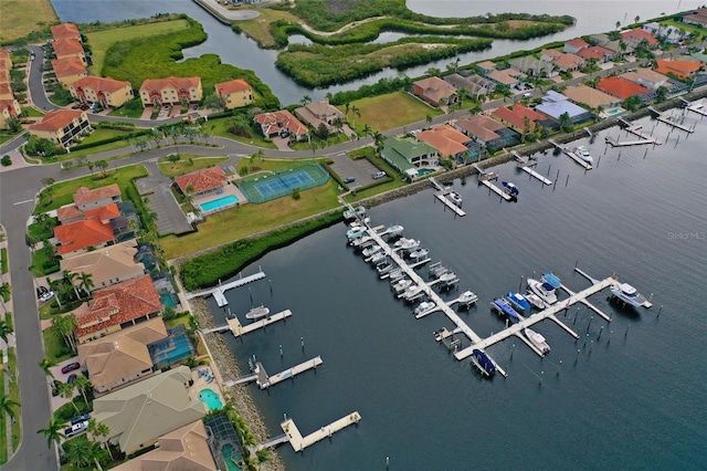 303 9th Ave E, Palmetto, FL 34221 - aerial view of property and surrounding area with a nearby body of water and a marina
