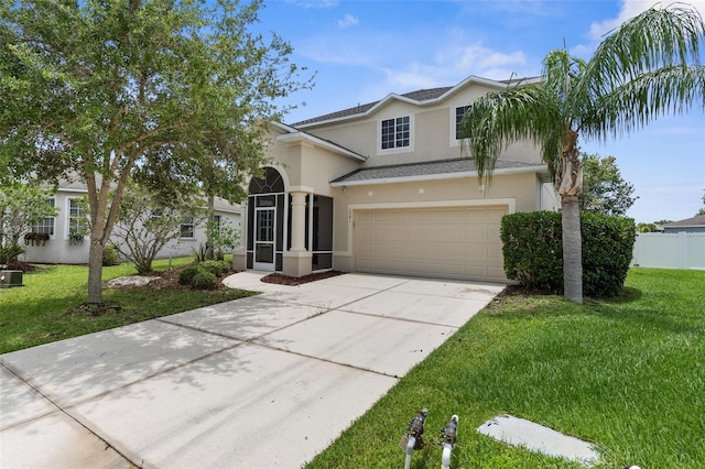 5981 Willows Bridge Loop, Ellenton, FL 34222 - traditional-style home with stucco siding, driveway, and an attached garage