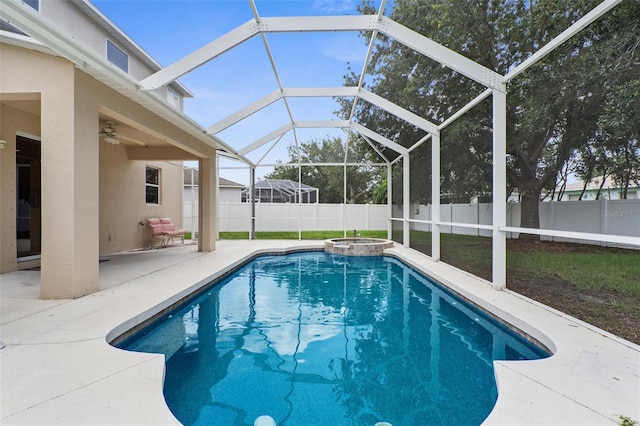 5981 Willows Bridge Loop, Ellenton, FL 34222 - view of swimming pool featuring a patio, a fenced backyard, a ceiling fan, and glass enclosure