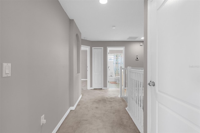 5981 Willows Bridge Loop, Ellenton, FL 34222 - hall with carpet floors, baseboards, arched walkways, and recessed lighting