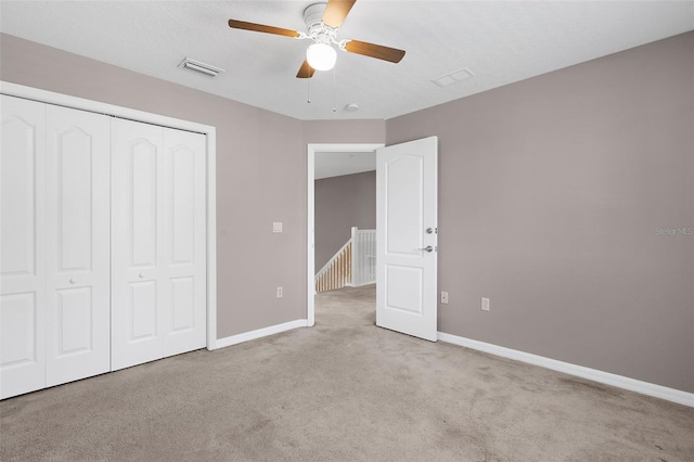 5981 Willows Bridge Loop, Ellenton, FL 34222 - unfurnished bedroom featuring carpet floors, baseboards, a closet, and a ceiling fan