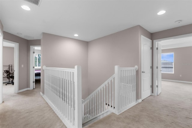5981 Willows Bridge Loop, Ellenton, FL 34222 - hallway with an upstairs landing, carpet, baseboards, and recessed lighting