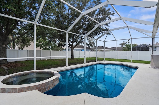 5981 Willows Bridge Loop, Ellenton, FL 34222 - view of pool with a fenced backyard, a pool with connected hot tub, glass enclosure, and a patio