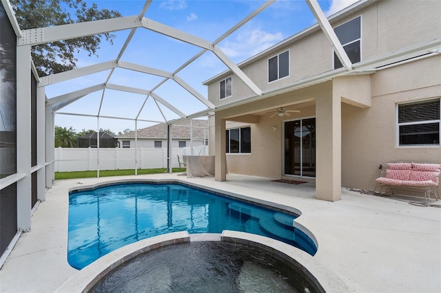 5981 Willows Bridge Loop, Ellenton, FL 34222 - view of pool featuring a patio, a ceiling fan, a pool with connected hot tub, and glass enclosure