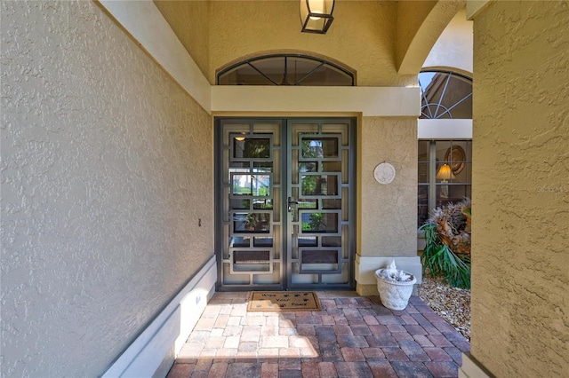 105 Inlets Blvd Unit 105, Nokomis, FL 34275 - entrance to property featuring stucco siding and french doors