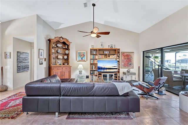 105 Inlets Blvd Unit 105, Nokomis, FL 34275 - tiled living area featuring ceiling fan and lofted ceiling