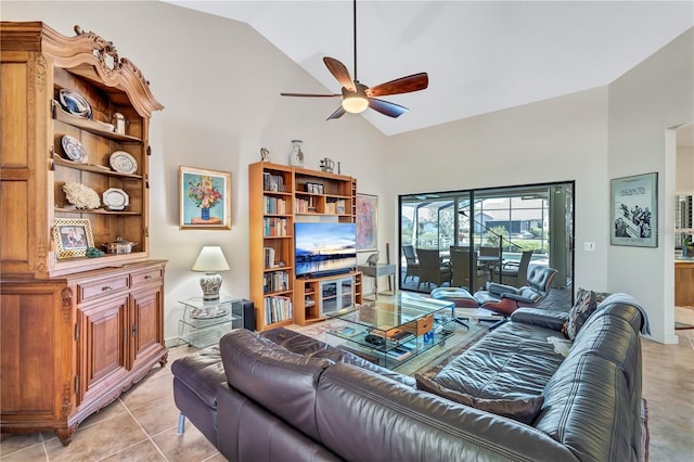 105 Inlets Blvd Unit 105, Nokomis, FL 34275 - living room with high vaulted ceiling, a ceiling fan, and light tile patterned floors