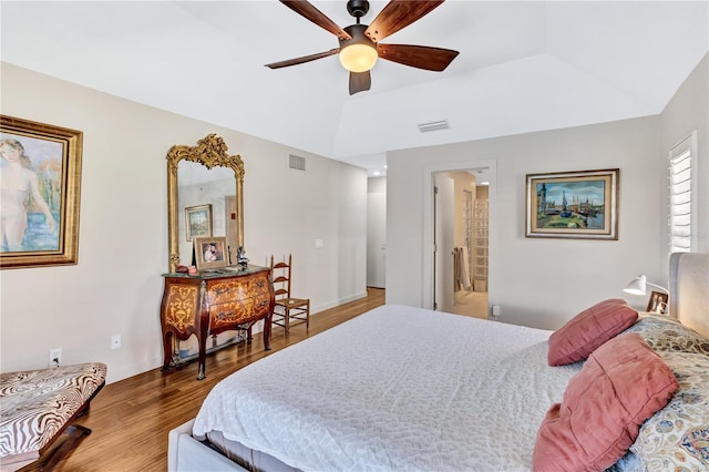 105 Inlets Blvd Unit 105, Nokomis, FL 34275 - bedroom with wood finished floors, vaulted ceiling, and ceiling fan
