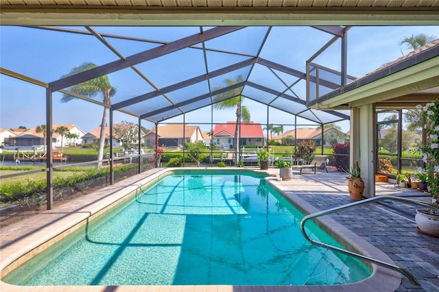 105 Inlets Blvd Unit 105, Nokomis, FL 34275 - swimming pool with a residential view, a patio area, and glass enclosure