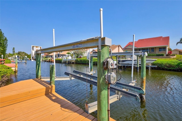 105 Inlets Blvd Unit 105, Nokomis, FL 34275 - dock area featuring boat lift and a water view