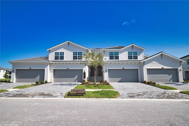 17715 Boracay Ct Unit 202, Venice, FL 34293 - traditional-style house with decorative driveway and a garage