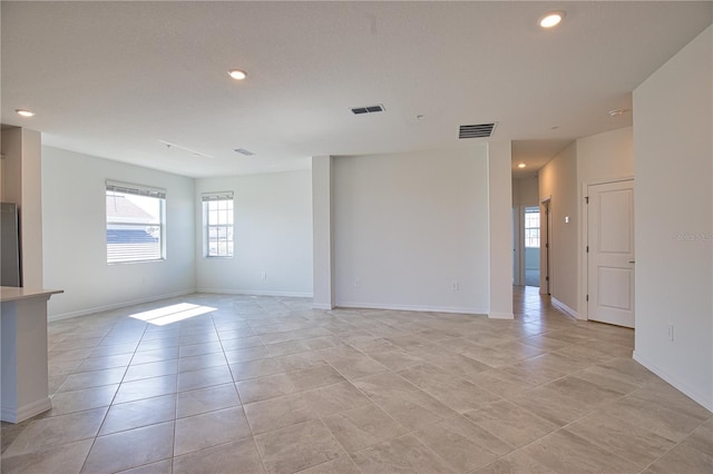 17715 Boracay Ct Unit 202, Venice, FL 34293 - spare room featuring recessed lighting, baseboards, and light tile patterned floors