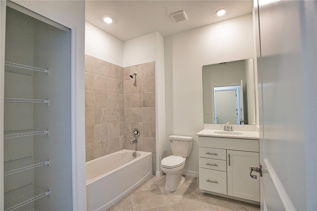 17715 Boracay Ct Unit 202, Venice, FL 34293 - bathroom featuring vanity, toilet, bathtub / shower combination, and tile patterned flooring