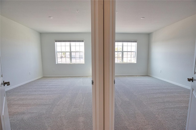 17715 Boracay Ct Unit 202, Venice, FL 34293 - carpeted empty room with baseboards