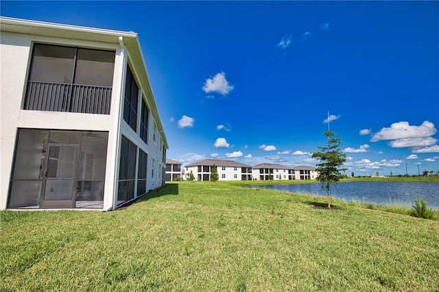 17715 Boracay Ct Unit 202, Venice, FL 34293 - view of green lawn with a water view