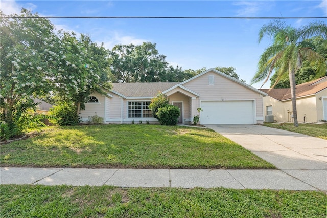 294 Lake Doe Blvd, Apopka, FL 32703 - ranch-style house with an attached garage, concrete driveway, and a front yard