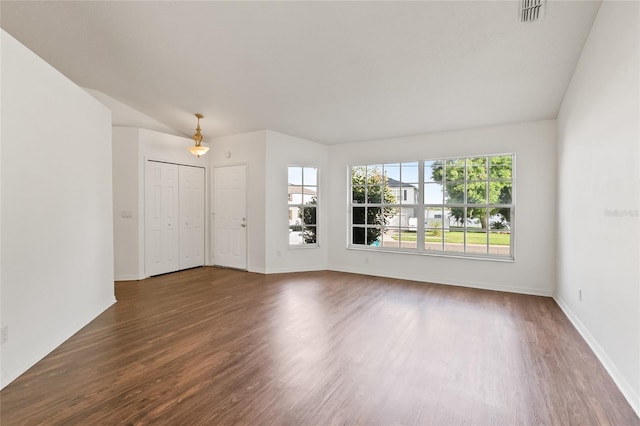 294 Lake Doe Blvd, Apopka, FL 32703 - unfurnished living room with wood finished floors and baseboards