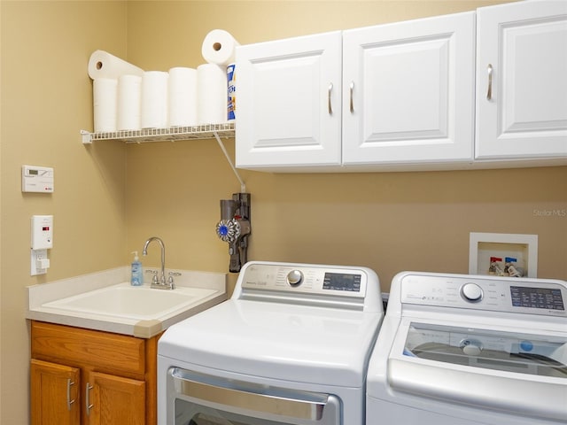 8078 Stirling Falls Cir, Sarasota, FL 34243 - washroom with washing machine and dryer and cabinet space
