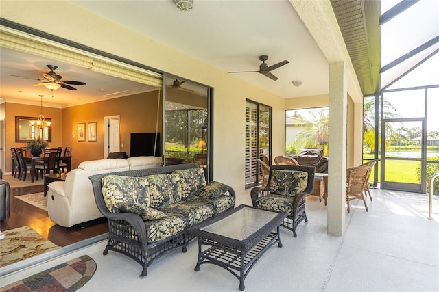 8078 Stirling Falls Cir, Sarasota, FL 34243 - sunroom / solarium featuring a ceiling fan, outdoor dining area, and outdoor lounge area