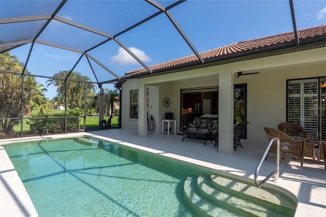 8078 Stirling Falls Cir, Sarasota, FL 34243 - outdoor pool with a patio, a ceiling fan, and glass enclosure