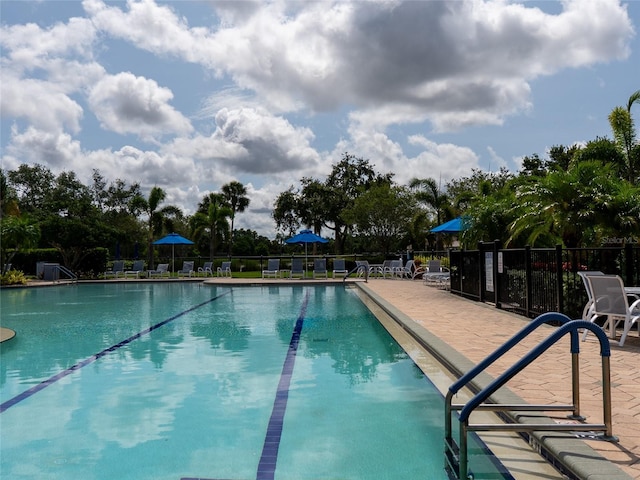 8078 Stirling Falls Cir, Sarasota, FL 34243 - community pool featuring a patio area