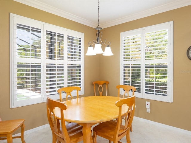 8078 Stirling Falls Cir, Sarasota, FL 34243 - dining room featuring ornamental molding, baseboards, light tile patterned floors, and a chandelier